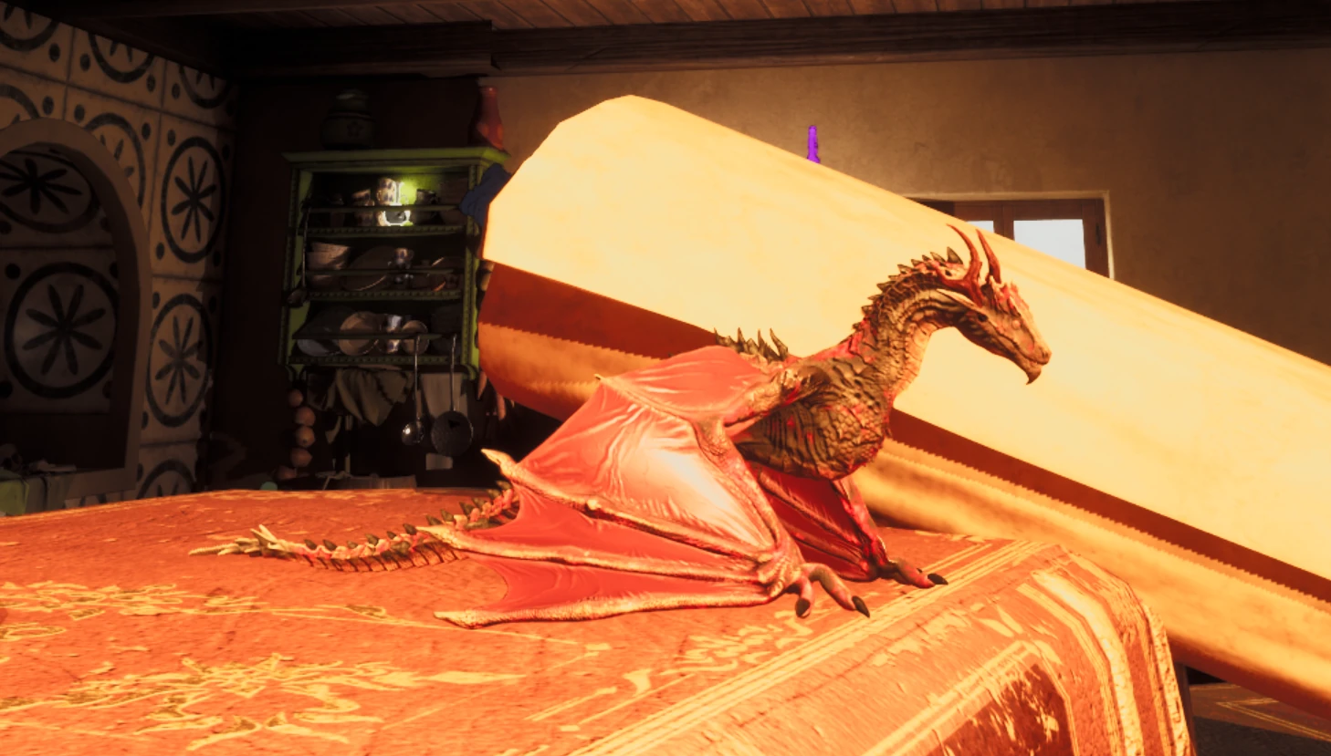 A small red and gold dragon rests on a large book in the Fantasy level.